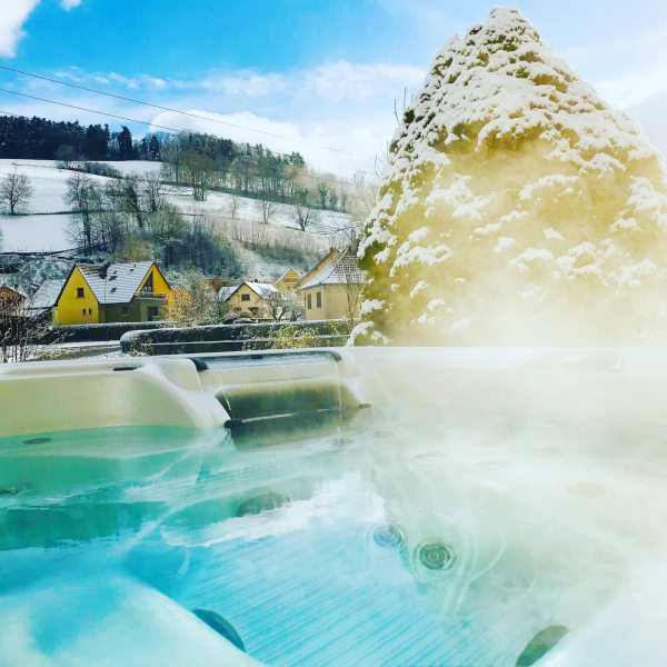 The outdoor hot tub in winter